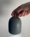 Watering bell, hand thrown by ceramicist Emily Dillon in Co Clare. Pottery handmade in Ireland. Ceramic watering can