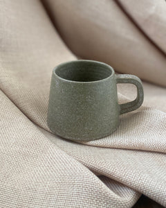 Hand thrown blue espresso cup with by ceramicist Emily Dillon