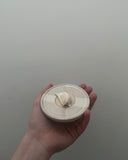 Hand thrown ceramic garlic grater made in Ireland by ceramicist Emily Dillon. Irish pottery