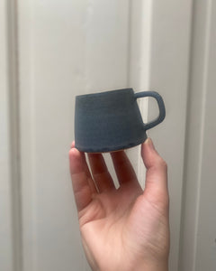 Hand thrown ceramic espresso cup made in Ireland by ceramicist Emily Dillon using stoneware clay