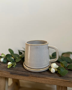 Hand thrown ceramic cup made in Ireland by ceramicist Emily Dillon using stoneware clay