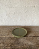 Hand thrown ceramic saucer made in Ireland by ceramicist Emily Dillon. Irish pottery