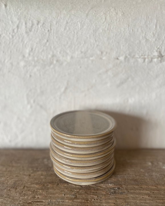 Hand thrown ceramic saucer made in Ireland by ceramicist Emily Dillon. Irish pottery
